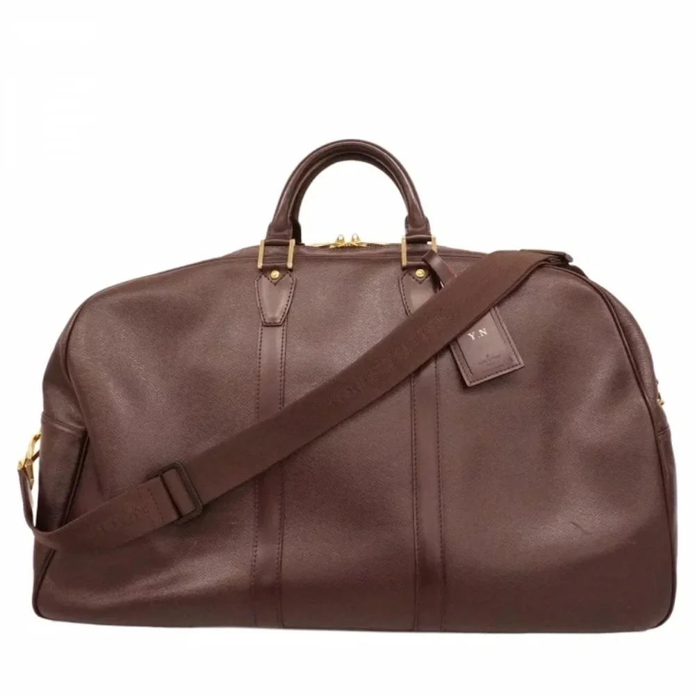 Authentic Louis Vuitton Kendall GM leather travel duffle bag carryon